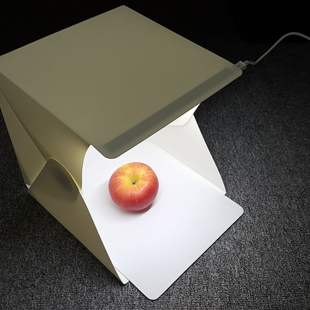 Foldable product photography light tent with adjustable LED lighting for high-quality, shadow-free photos.