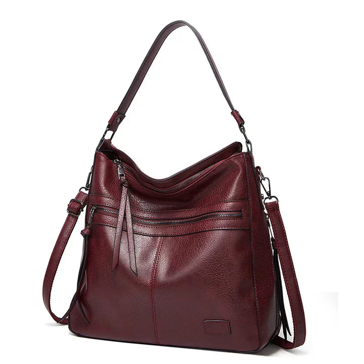 Sophisticated women's genuine leather luxury handbag, featuring elegant design and durable construction.