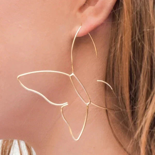 Elegant women's large butterfly dangle earrings, nature-inspired design in gold/silver finish, perfect fashion jewelry.