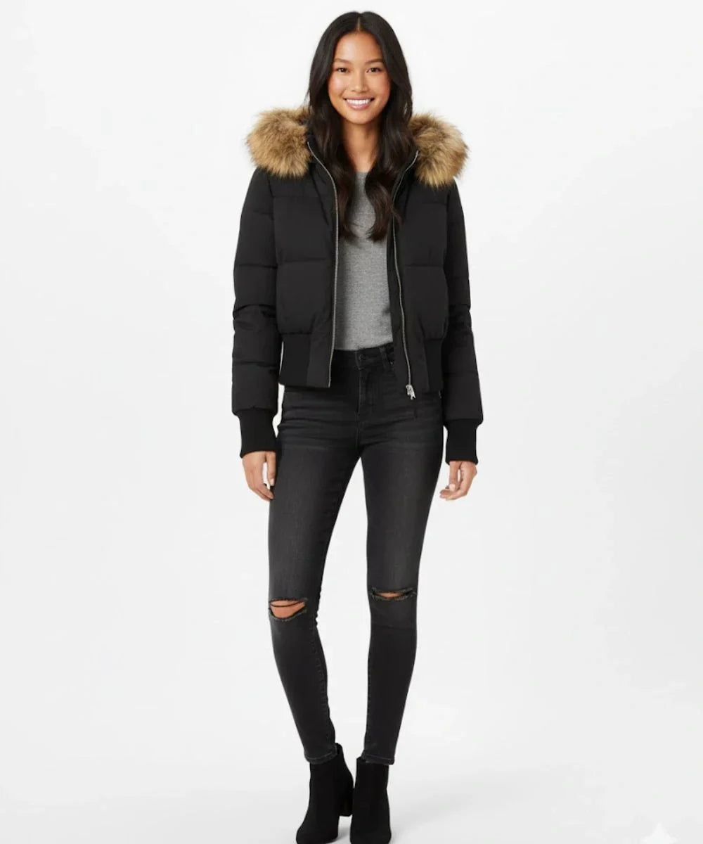 Cozy women's puffer jacket, warm and chic, with a soft faux fur hood.
