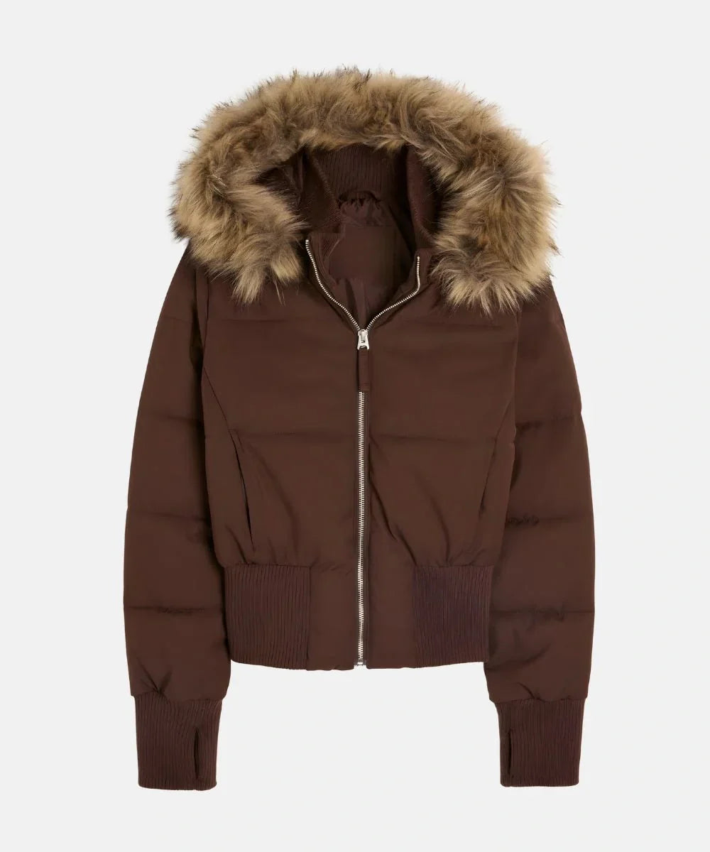 Women's winter essential: a warm, quilted hooded jacket with a faux fur trim.