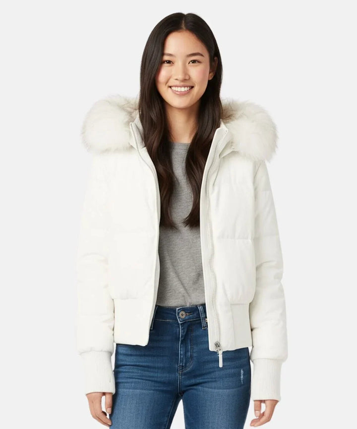 Slim fit women's puffer jacket with a comfortable faux fur hood for cold days.