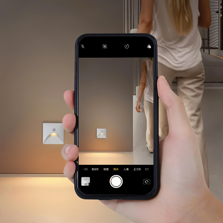 Stylish LuminiPath LED wall lamp, motion sensor, enhances home decor with ambient lighting.