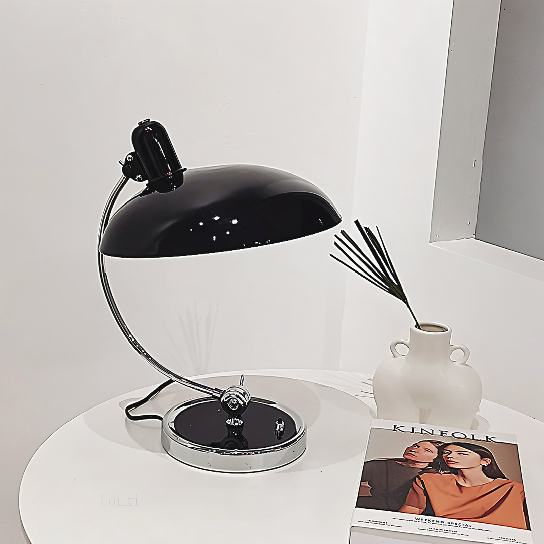 Heavy-duty industrial reading lamp, adjustable for optimal task lighting on your desk.
