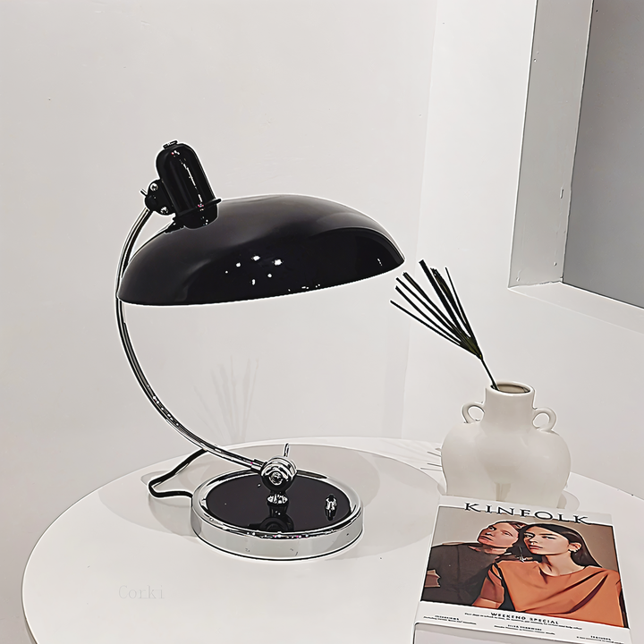 Heavy-duty industrial reading lamp, adjustable for optimal task lighting on your desk.