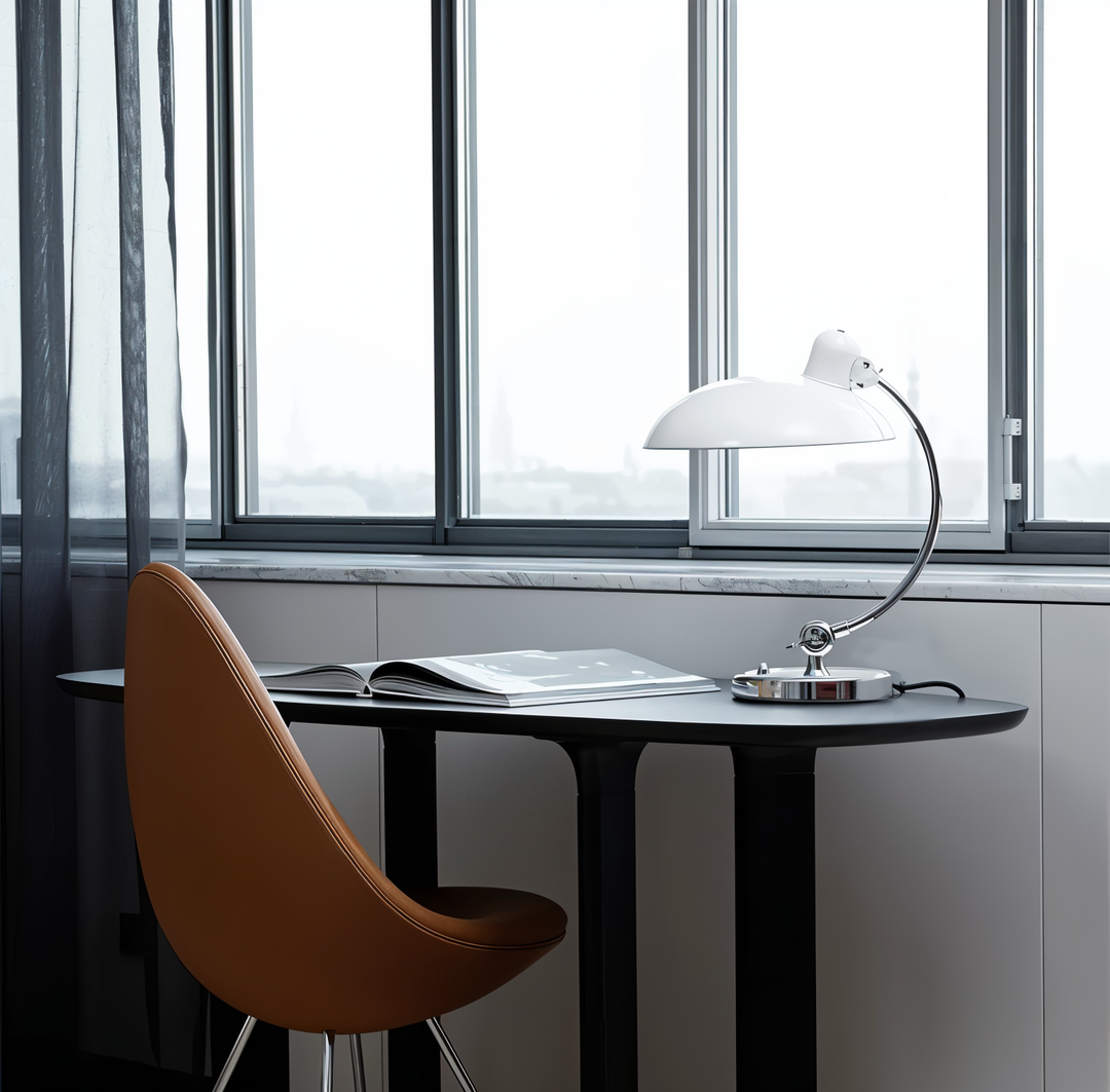 Classic vintage industrial desk lamp, featuring an adjustable arm for targeted light.