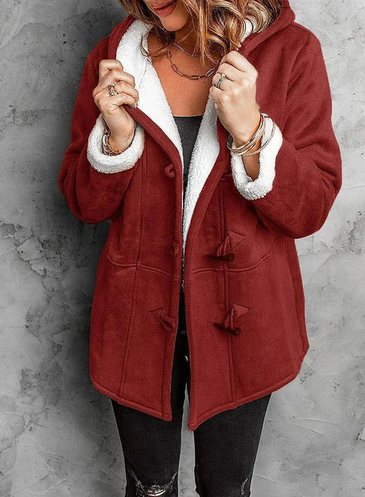 Women's hooded winter coat. Toggle closure, warm and cozy outerwear for ultimate cold weather comfort.
