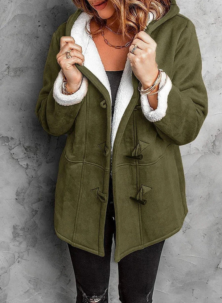 Chic women's hooded winter coat. Features warm fabric and toggle front, perfect for cold weather fashion.