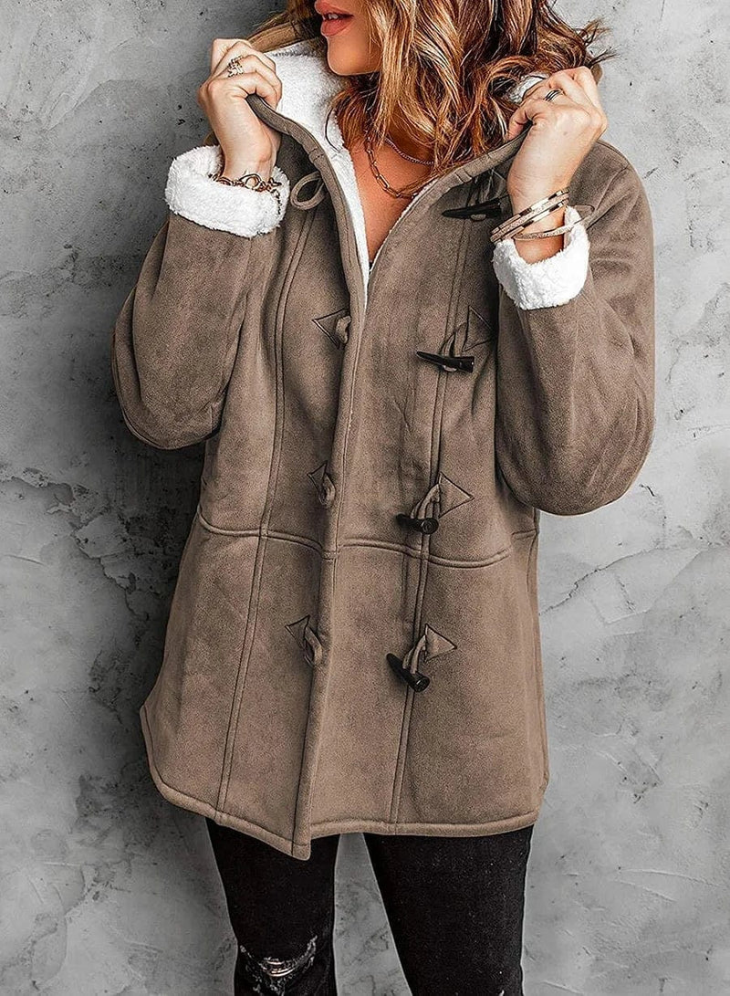 Durable women's toggle winter coat. Hooded and warm, an ideal cold weather outerwear essential.
