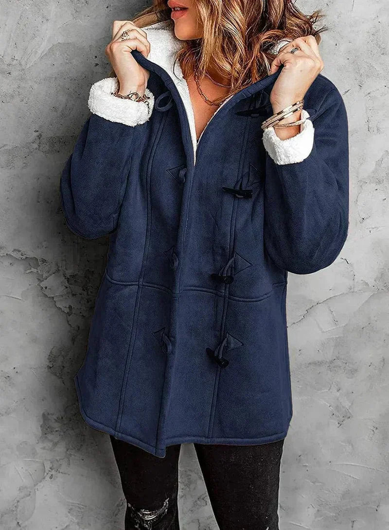 Everyday women's hooded winter jacket. Toggle closure, warm and stylish for cold weather casual wear.