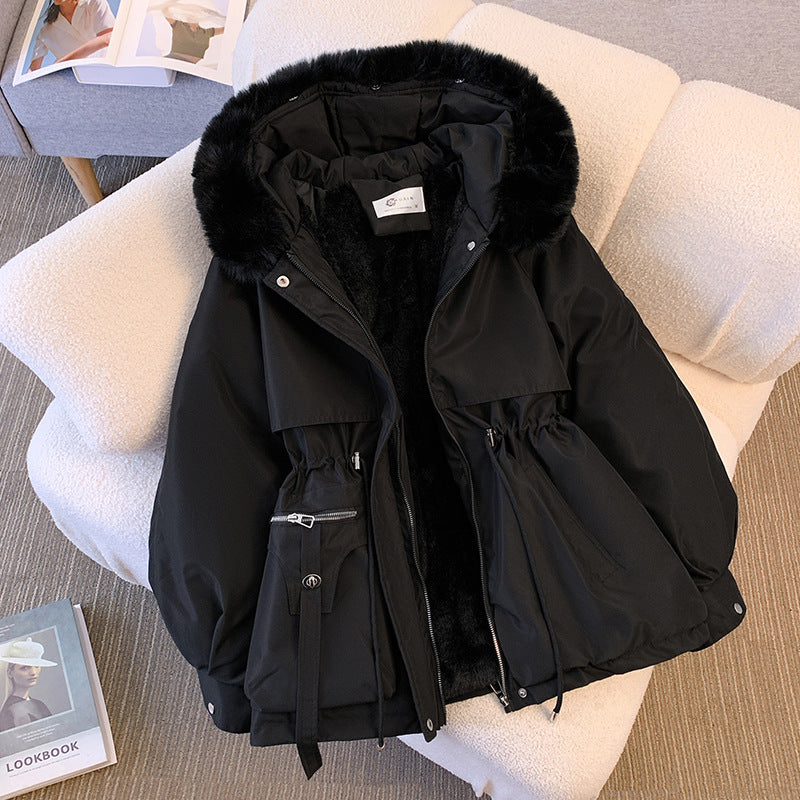 Elegant women's warm winter coat. Stylish & cozy insulated outerwear for cold weather fashion.