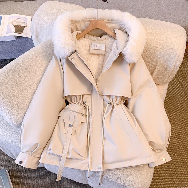Stylish women's winter coat. Elegant and warm clothing, ideal for cold weather outerwear.