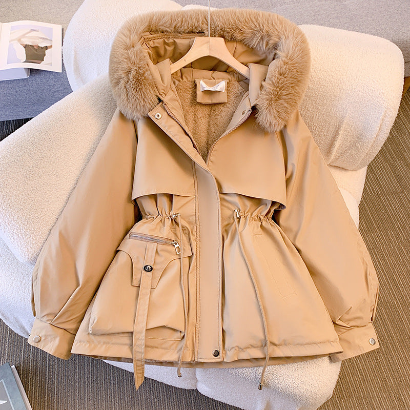 Women's insulated elegant winter coat. Stylish and warm outerwear, perfect for cold weather fashion.
