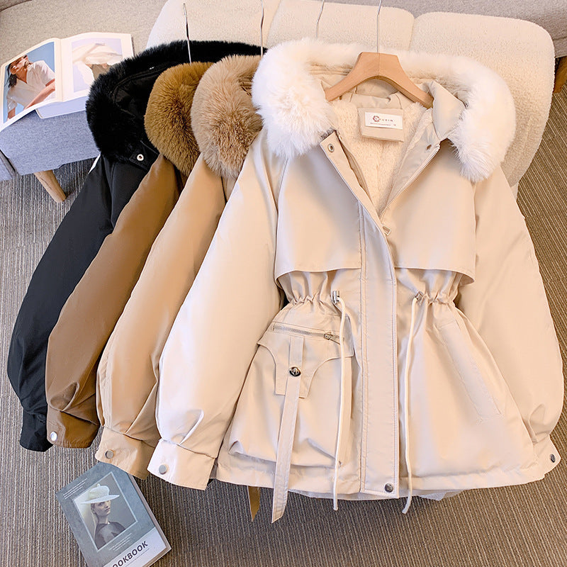 Warm & elegant women's winter coat. Fashionable outerwear for ladies, perfect for cold weather style.