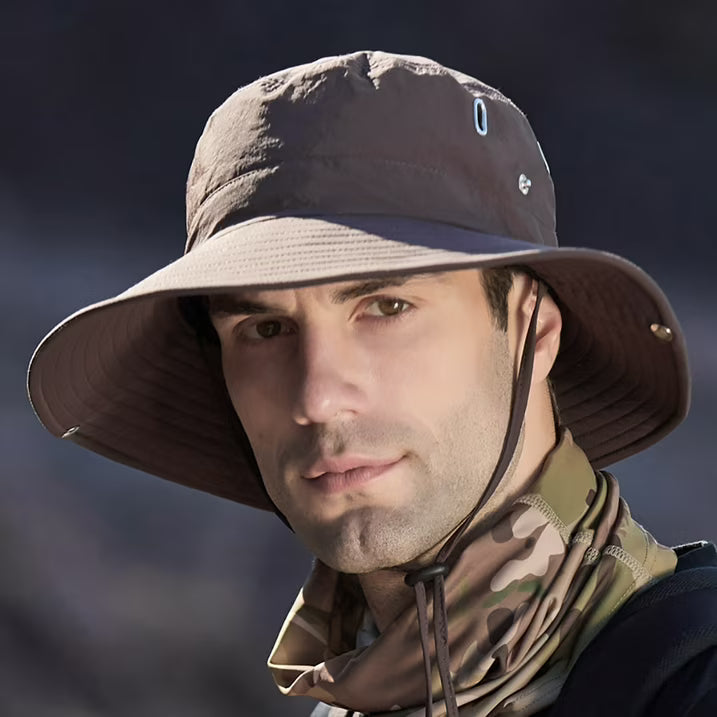 Unisex wide-brimmed sun hat with UV protection. Breathable fabric for hiking, fishing, and beach days.