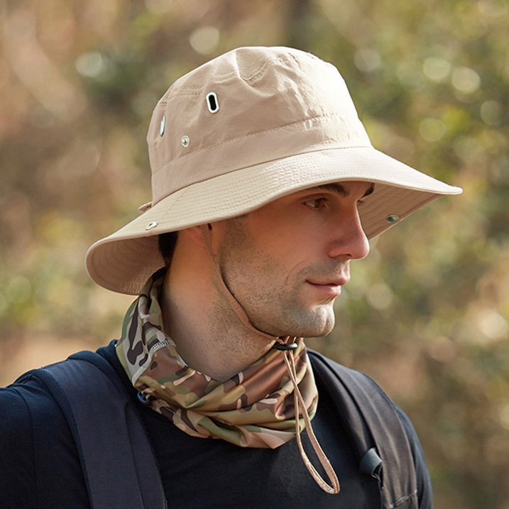 Outdoor sun hat, unisex, with wide brim & UV protection. Breathable, great for summer adventures.