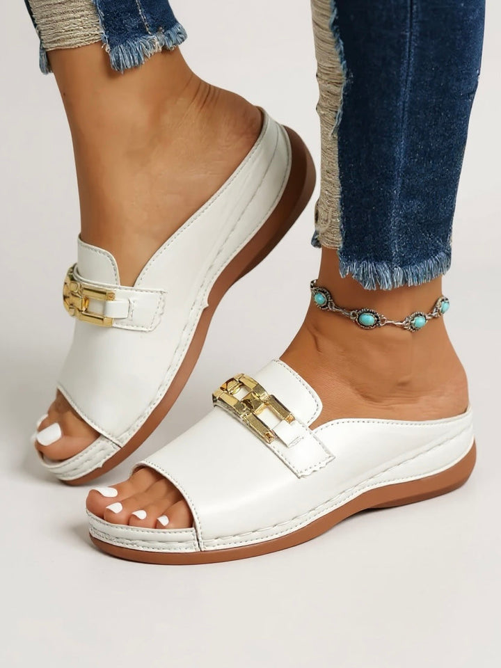 Cushioned women's slip-on slides, minimalist design. Ideal for summer casual wear, travel & everyday comfort.