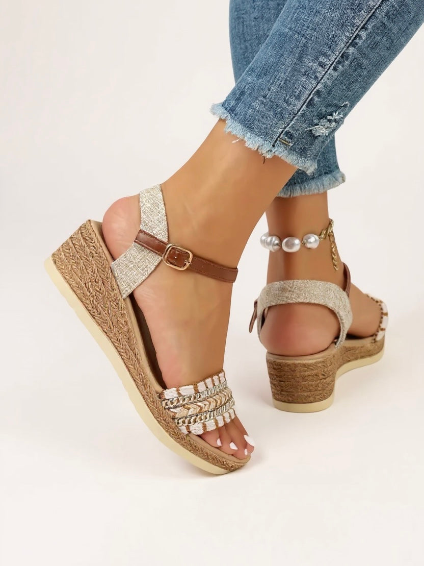 Elegant women's braided wedge sandals with a unique design, ideal for stylish warm-weather looks.