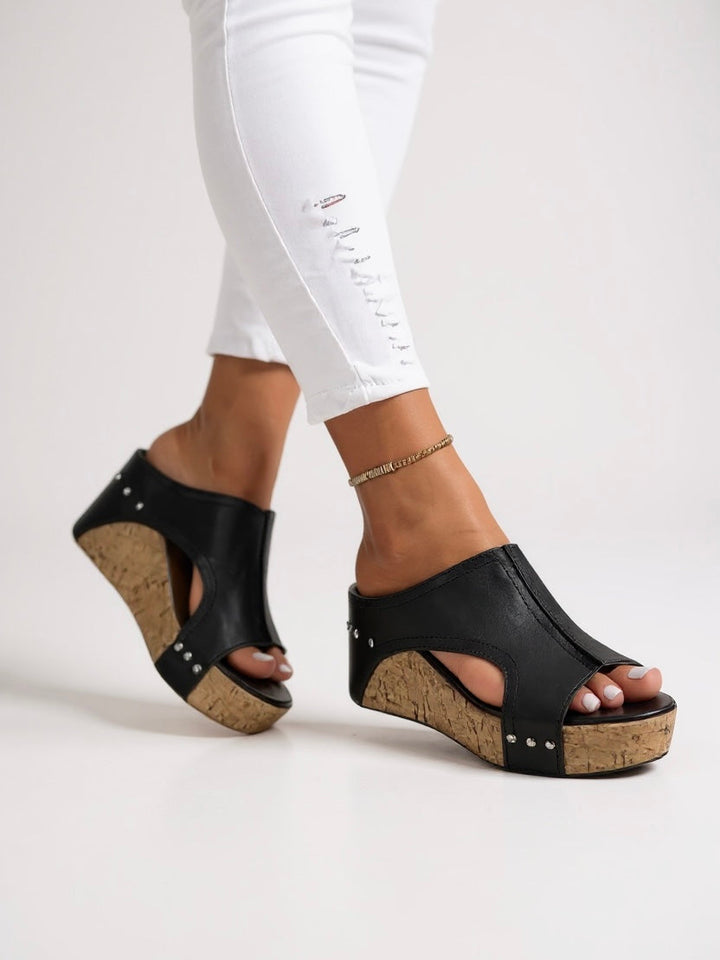 Women's elegant wedge slide sandals, perfect for chic summer style and comfortable casual wear.