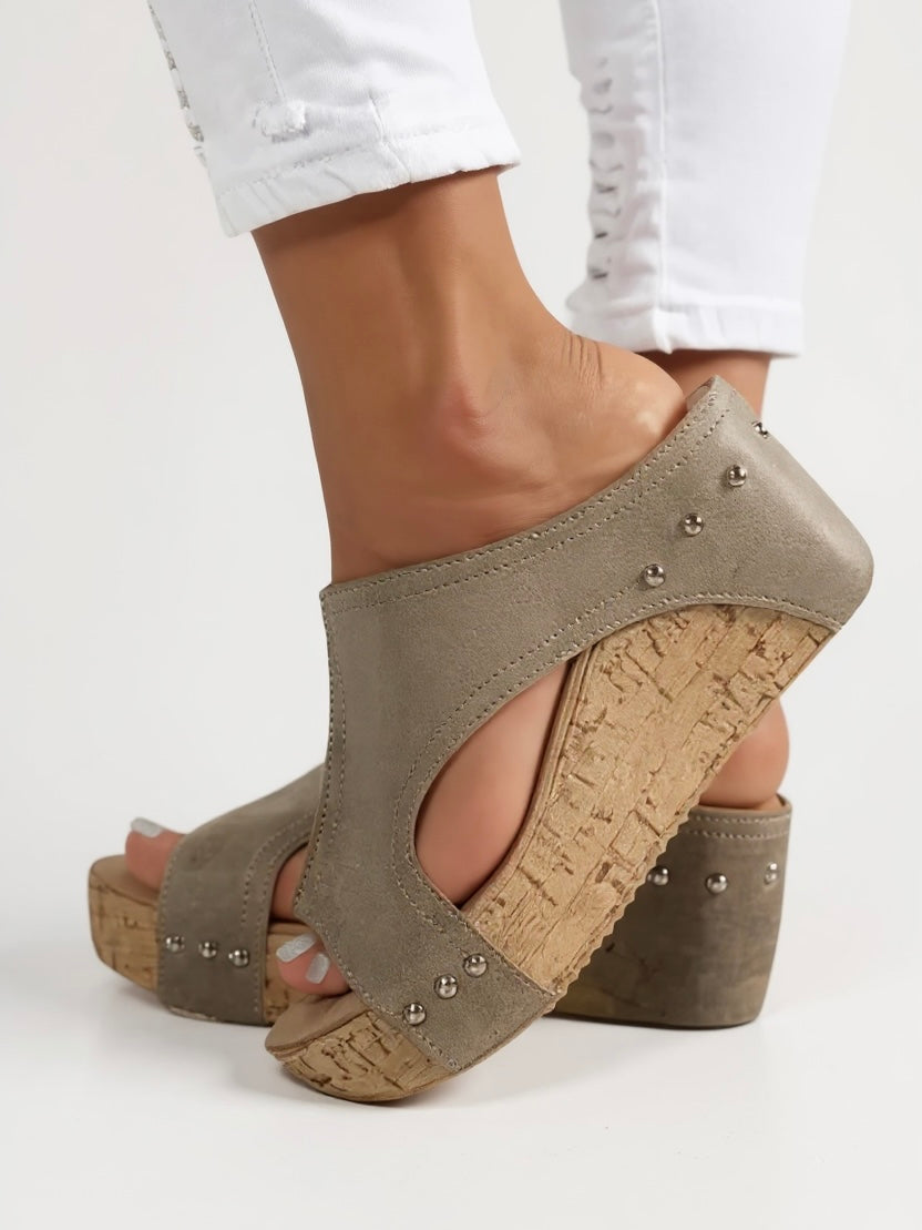 Comfortable wedge slide sandals for women, a must-have elegant footwear for summer and casual events.
