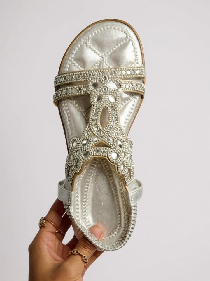 Dressy women's sandals featuring sparkling embellishments, perfect for elegant evening wear.