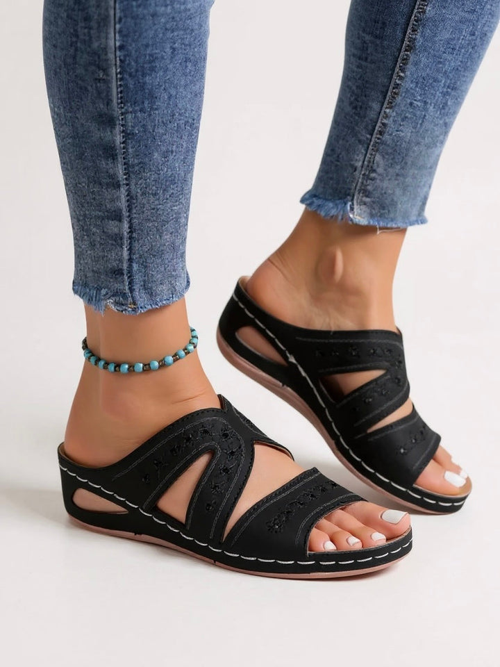 Comfortable women's embroidered sandals, easy slip-on style for warm weather fashion.