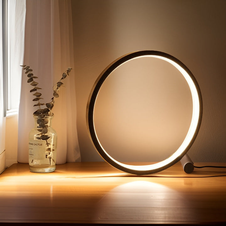 Sleek black dimmable LED table lamp, a modern decor piece for living room or office desk.