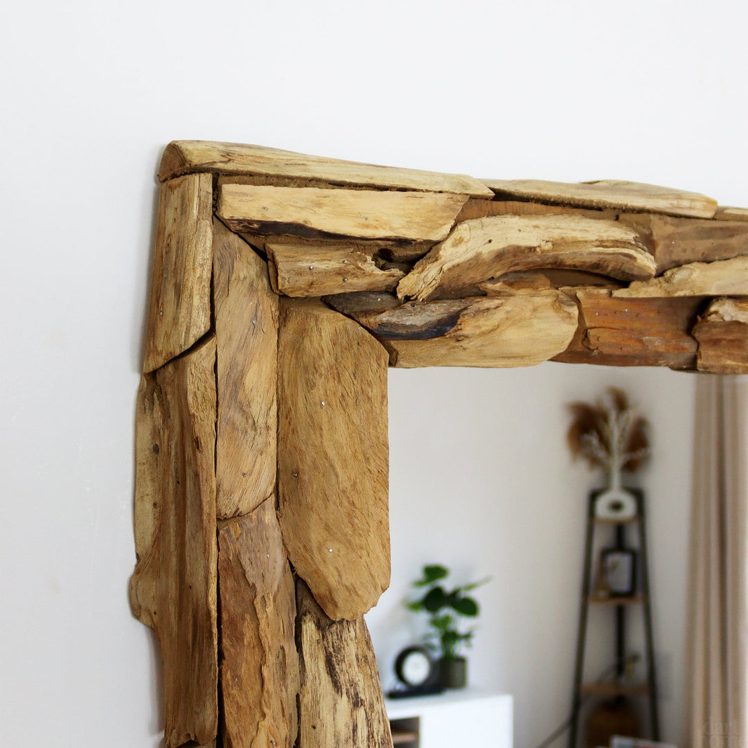 Eco-friendly rectangular wall mirror with a unique reclaimed teak wood frame, ideal for a stylish and rustic entryway.