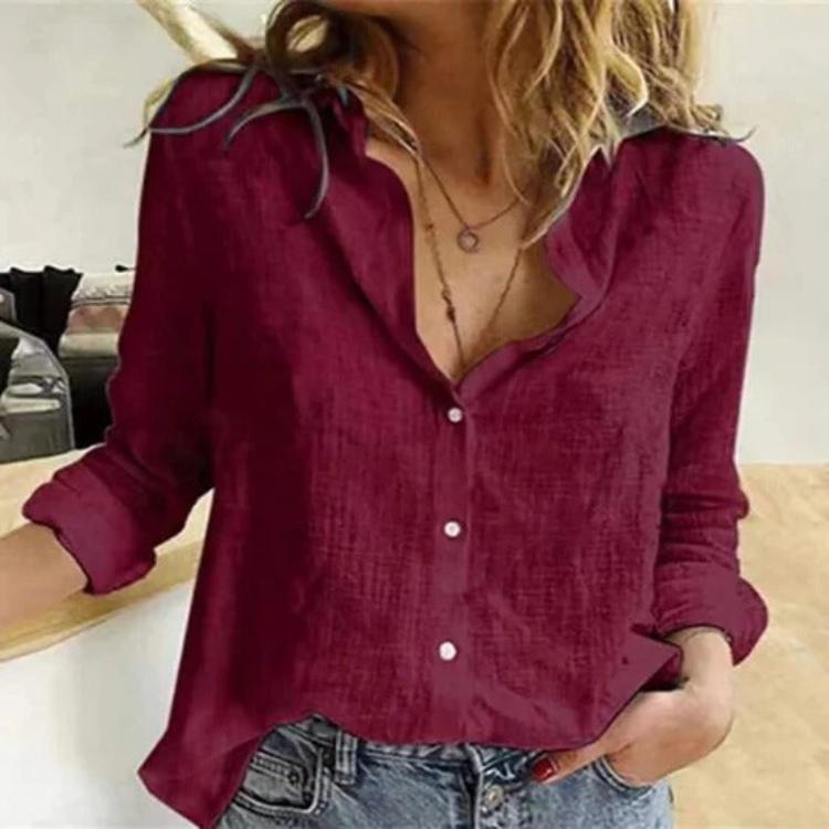 Woman wearing a relaxed fit summer blouse, long sleeve, perfect for effortless daily style.
