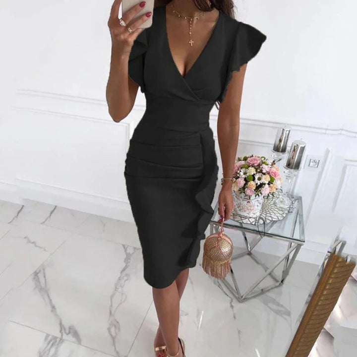 Elegant women's party dress with chic statement sleeves, perfect for formal events & special occasions.