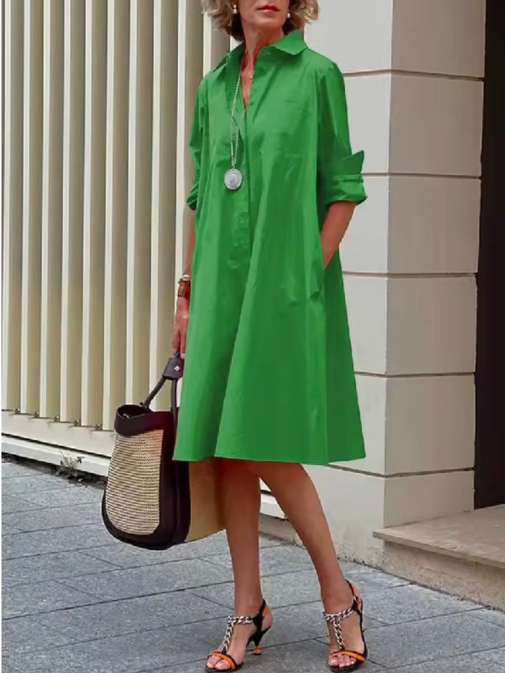 Women's classic A-line shirt dress with collar and button-down front, perfect for versatile everyday wear.