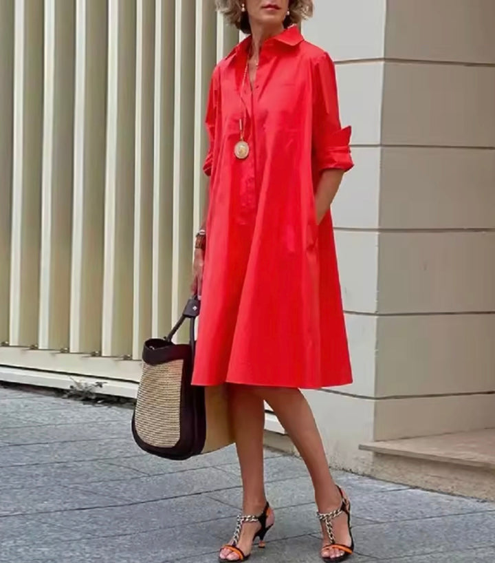 Stylish women's A-line shirtdress. Classic collared button-down dress for an elegant, comfortable, and casual look.