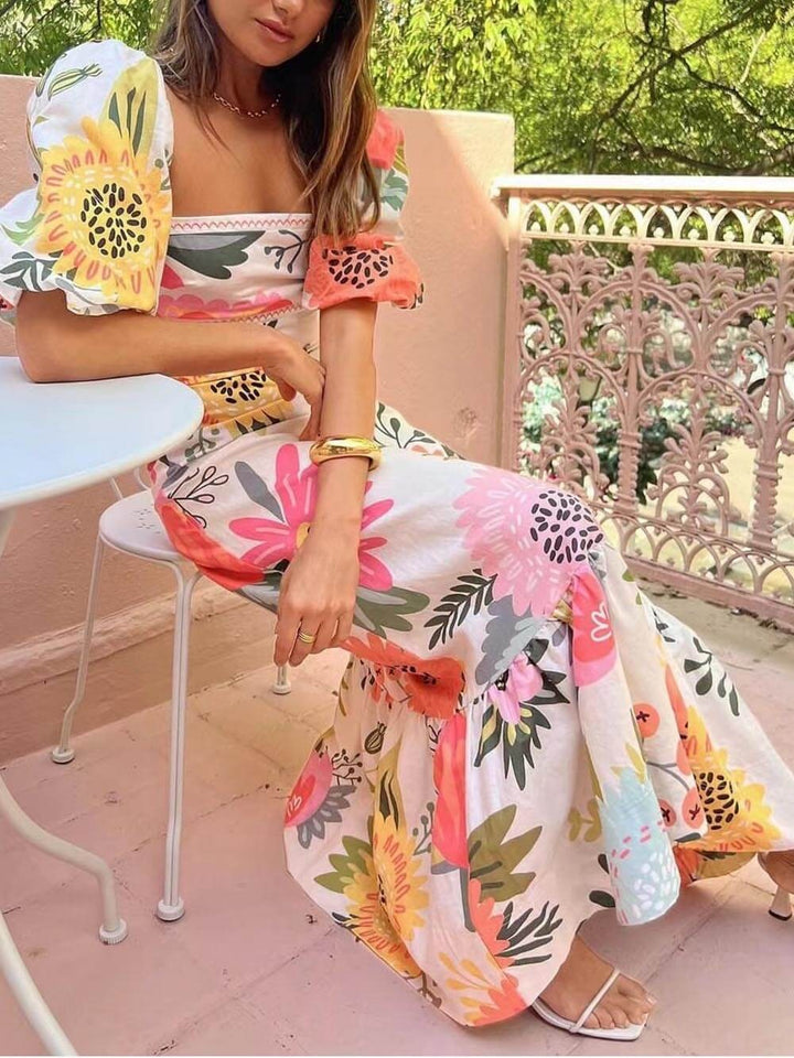 Elegant women's flowy floral summer dress, sleeveless v-neck design, ideal for casual spring parties & beachwear.