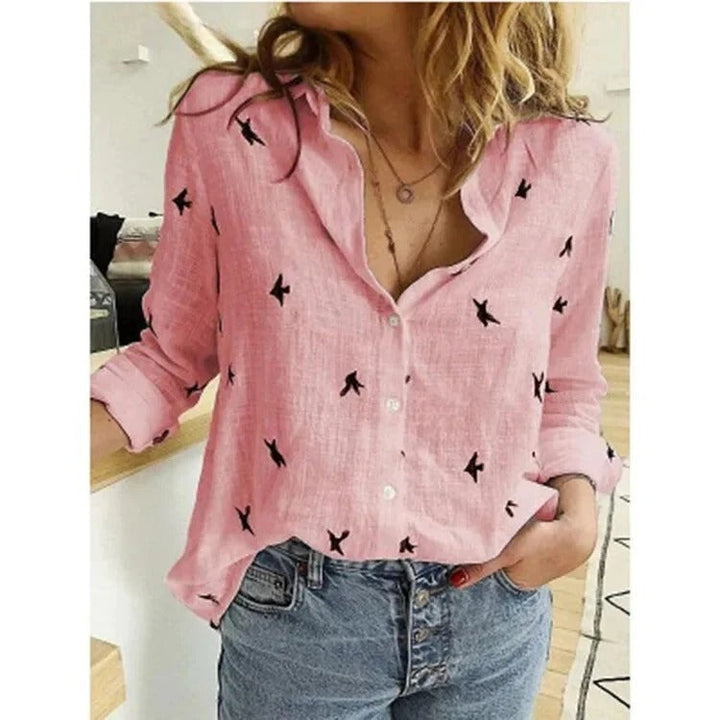 Breathable women's summer blouse with relaxed fit & long sleeves, ideal for warm weather comfort.