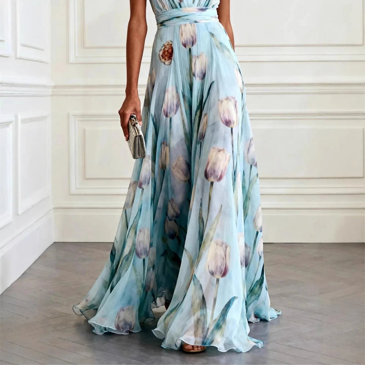 Women's sleeveless floral print maxi wrap dress. Elegant, flowing design for parties & evening events.