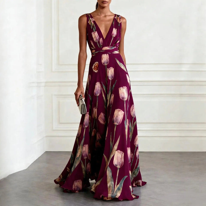 Sleeveless V-neck maxi wrap dress for women. Flowing elegant design, ideal as a party or evening gown.