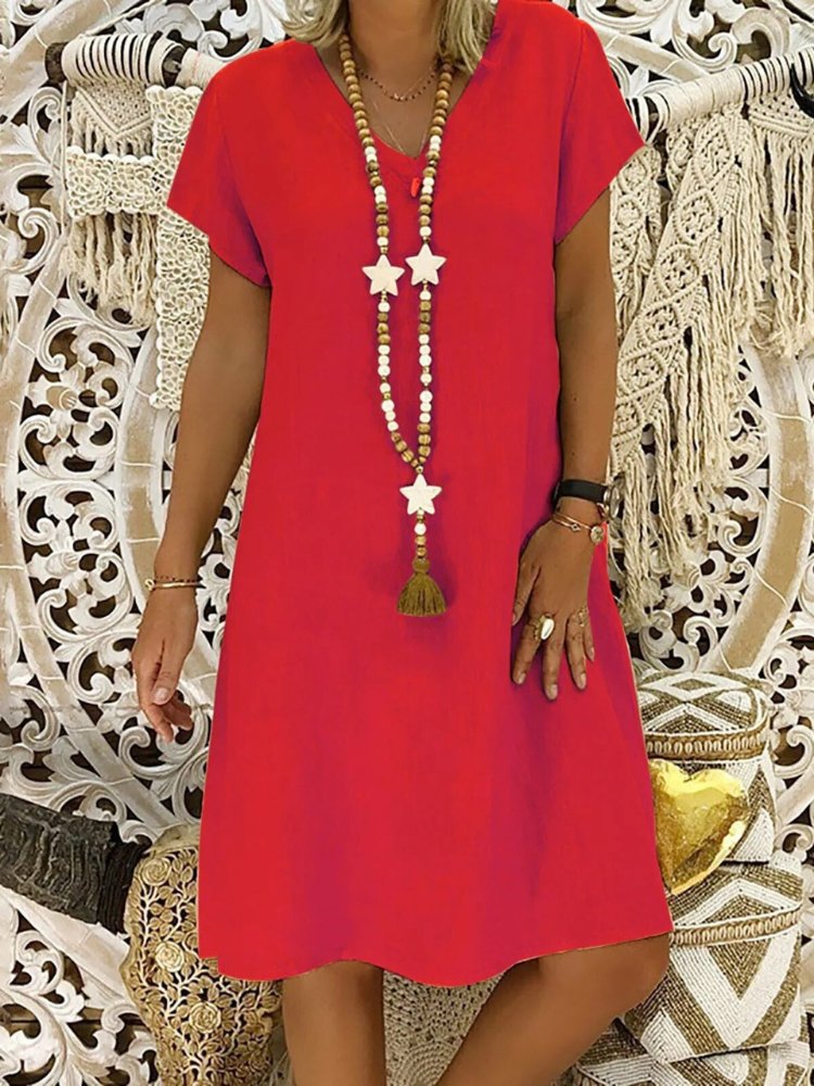 Flattering women's V-neck mini dress, A-line silhouette with short sleeves, ideal for elegant everyday style.