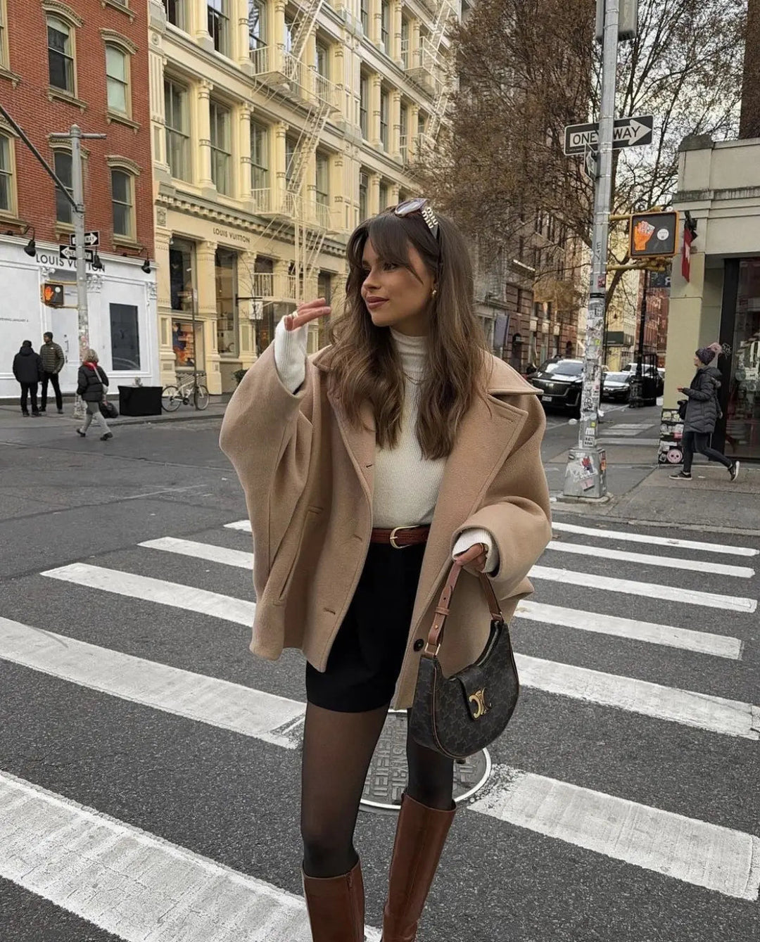 Women's elegant short coat jacket for fall fashion layering. Chic outerwear for winter style.