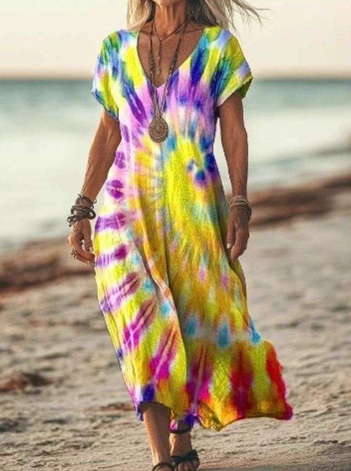Model in a comfortable women's floral print midi dress, ideal for effortless casual summer style. Versatile fashion.