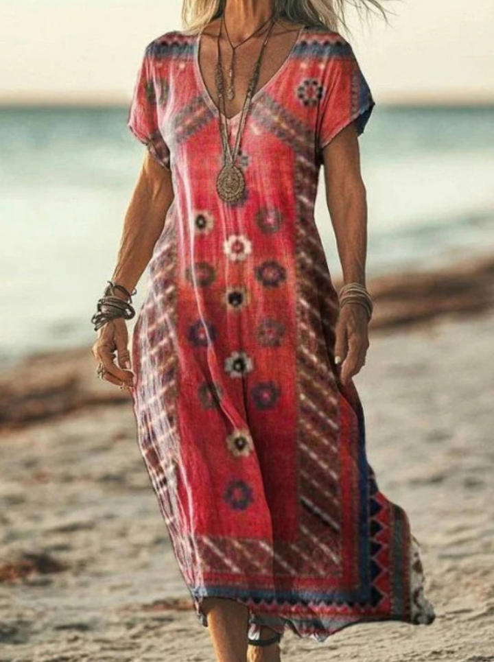 Elegant women's floral print midi dress styled for a party. Perfect versatile summer dress for special occasions.