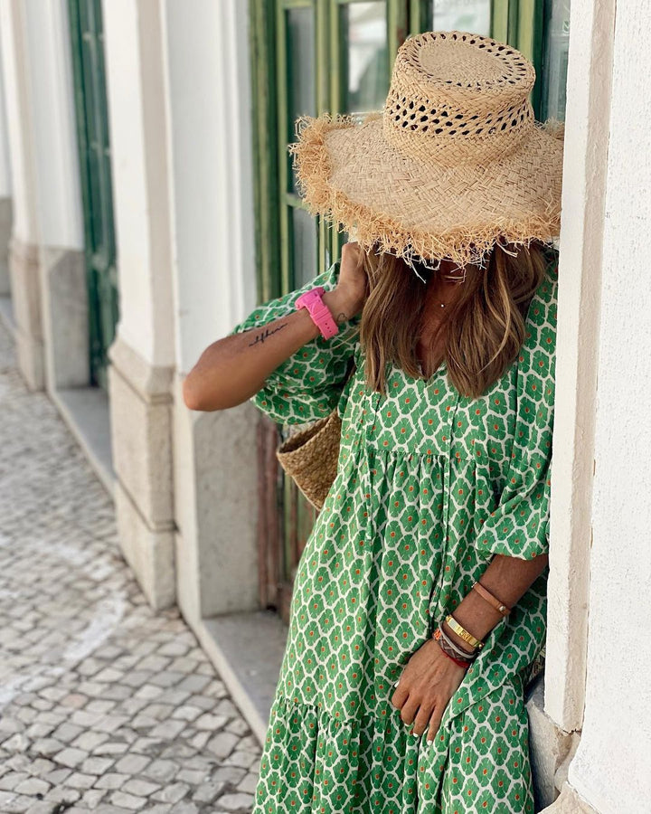 Vibrant patterned bohemian summer dress, long and flowy, ideal for casual women's fashion.