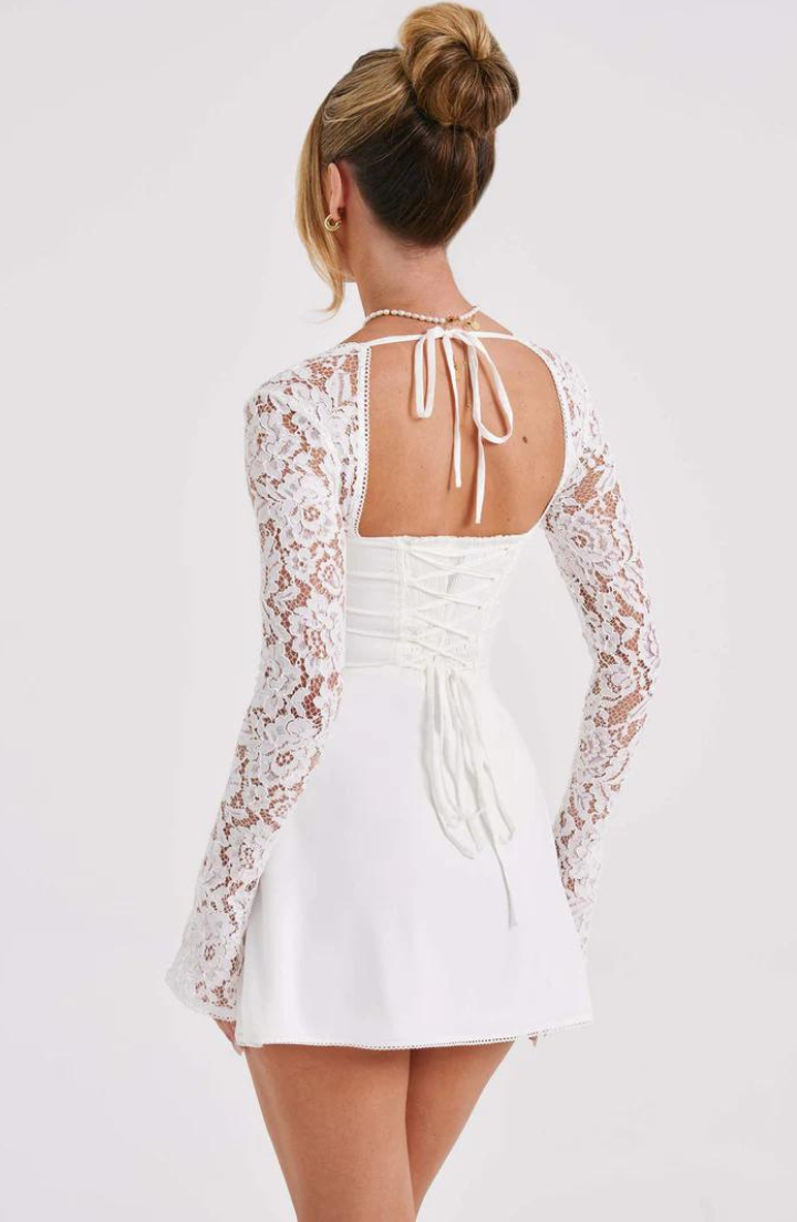 Women's elegant Jacinta long sleeve mini dress, a sophisticated cocktail party dress.