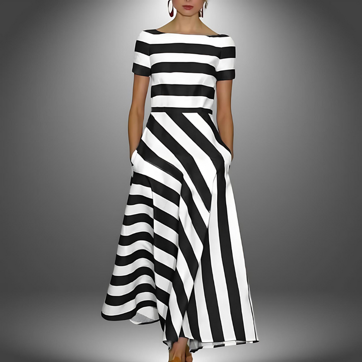 Elegant women's striped summer maxi dress. Versatile, long, and flowy for comfortable casual wear.