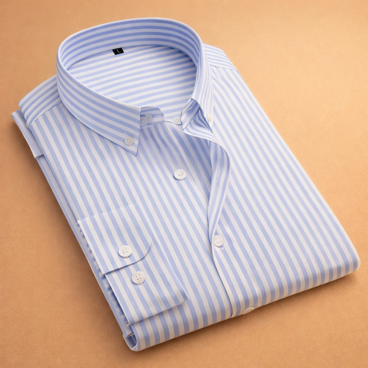 Model wearing a men's long sleeve tailored vertical stripe top, showcasing its modern fitted style.