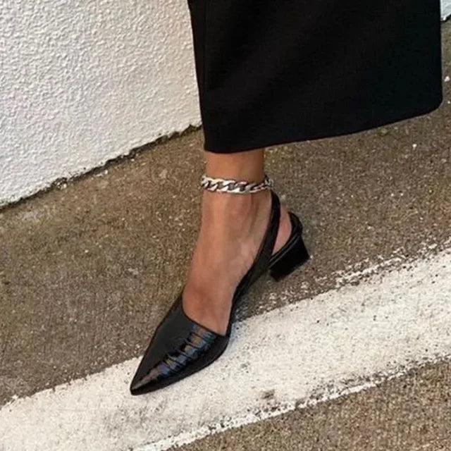 Comfortable and stylish women's mid-heel pumps, ideal as dress shoes for formal or casual elegance.
