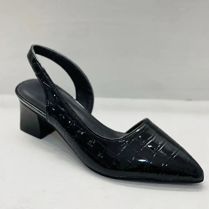 Classic pointed toe mid-heel pumps for women, offering comfortable and versatile formal footwear.