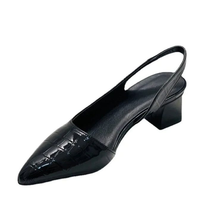 Stylish women's elegant pointed toe pumps with a comfortable mid-heel, perfect as business or formal wear.