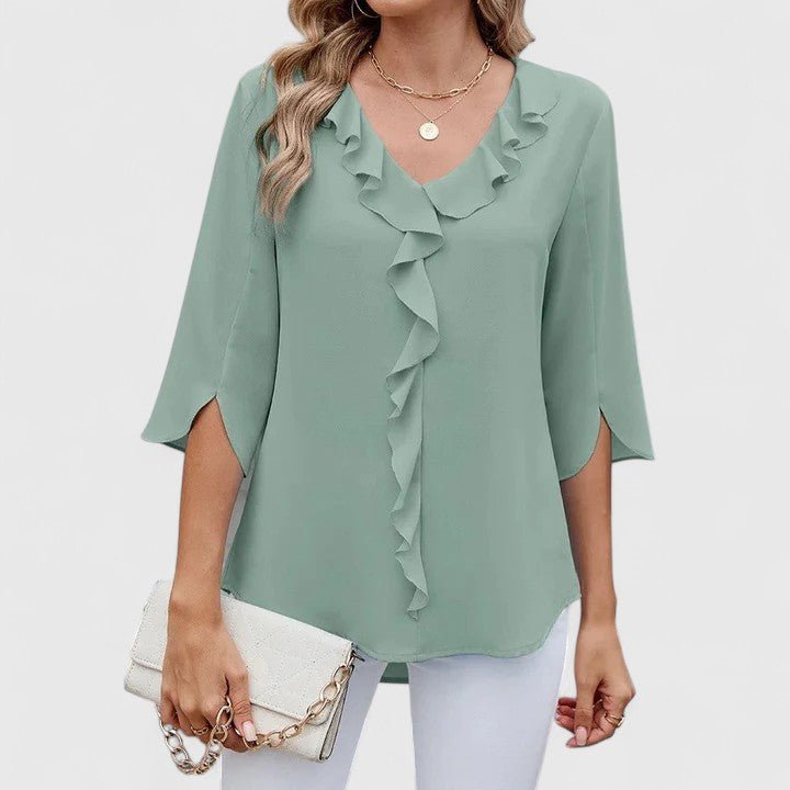 Women's elegant ruffle V-neck half-sleeve blouse for versatile fashion.