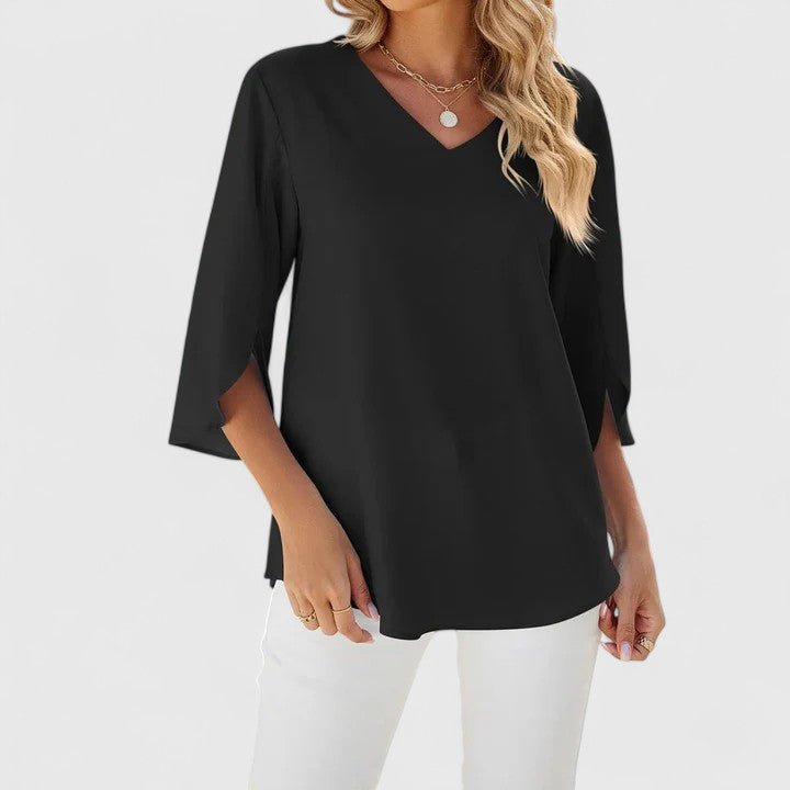 Full-length view of a women's elegant ruffle V-neck half-sleeve blouse, a stylish everyday top.