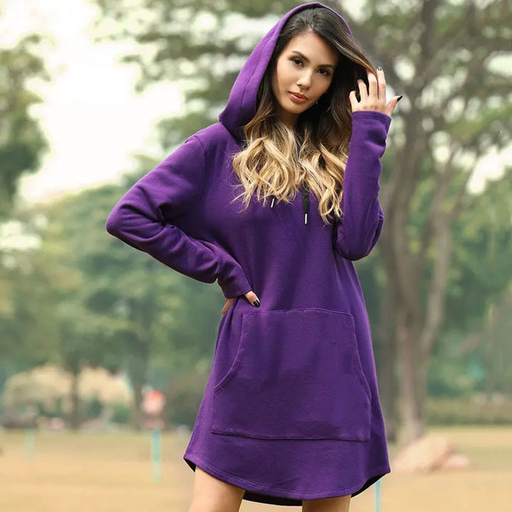 Cozy women's long hoodie dress with pockets, perfect for ultimate comfort and stylish fall/winter outfits.